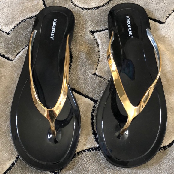 black plastic flip flops